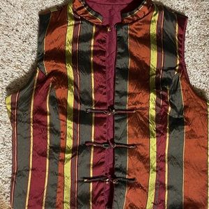 Striped reversible shiny vest. Small